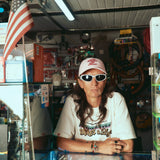 CAMISETA AMORES Y LUJOS CREMA